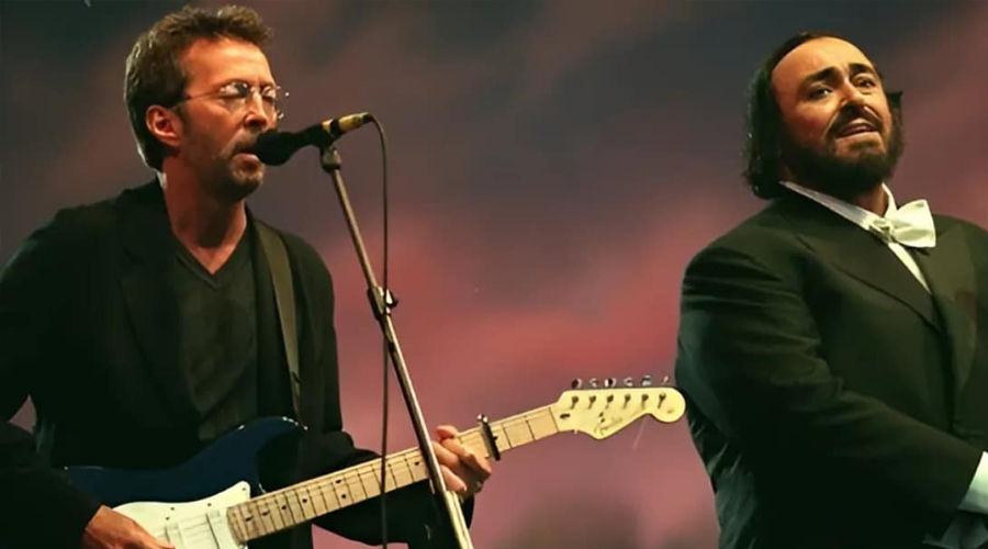 Eric Clapton And Luciano Pavarotti’s Powerful “Holy Mother” Duet Conquer Millions Of Hearts