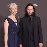 Keanu Reeves’ girlfriend, 54, faces mixed reactions after posing in teal cut-out dress on red carpet