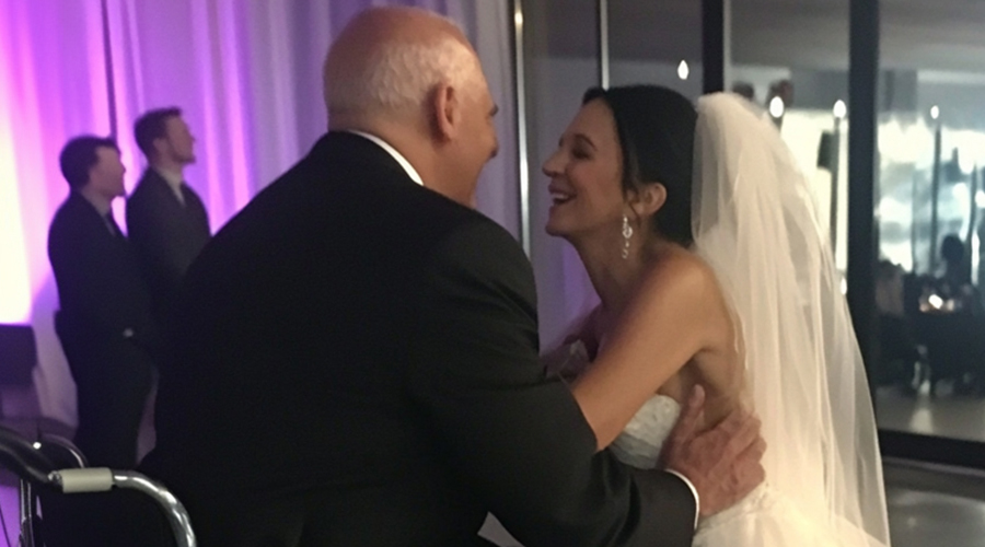 Bride Doesn’t Want Her Dad In Wheelchair To Walk Her Down The Aisle Until She Sees Him On TV — Story Of The Day