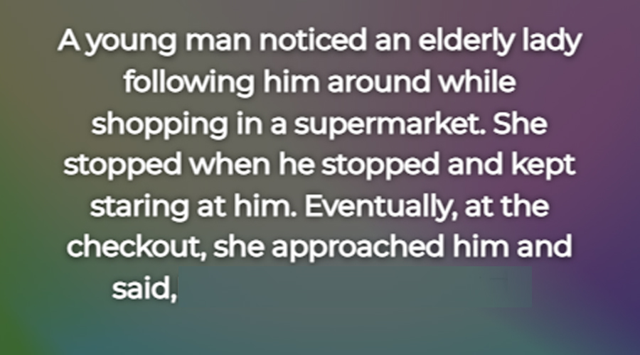 A Young Man Notices A Lady Fol lowing Him