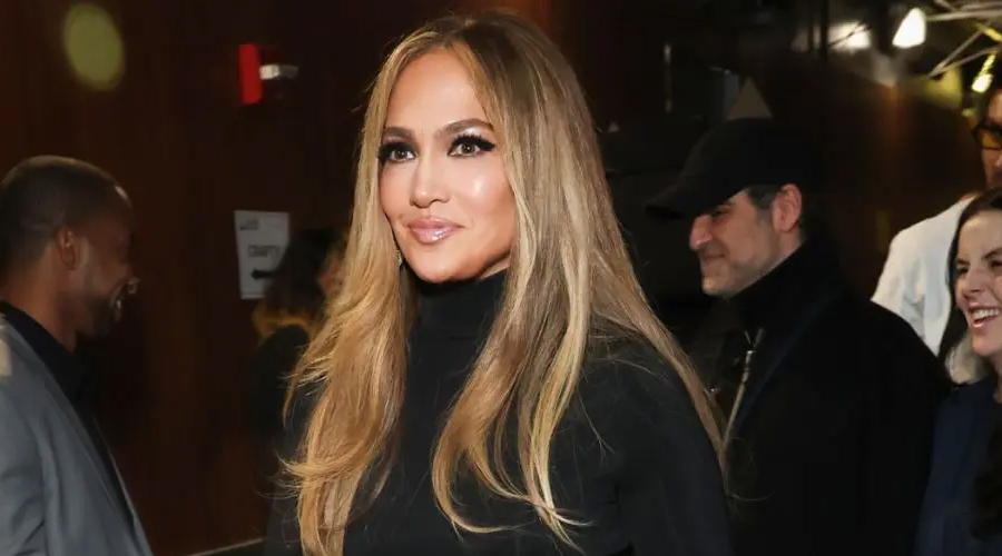 Jennifer Lopez made a surprise entrance at the Grammys and captured all the attention in a sheer skirt.