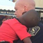 OFFICER DAVID LET ME HOLD HIS HAND UNTIL MOM CAME BACK