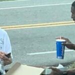 Selfless officer spends his lunch break sharing pizza with a homeless woman