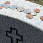 Meaning Behind the Tradition of Coins on Gravestones